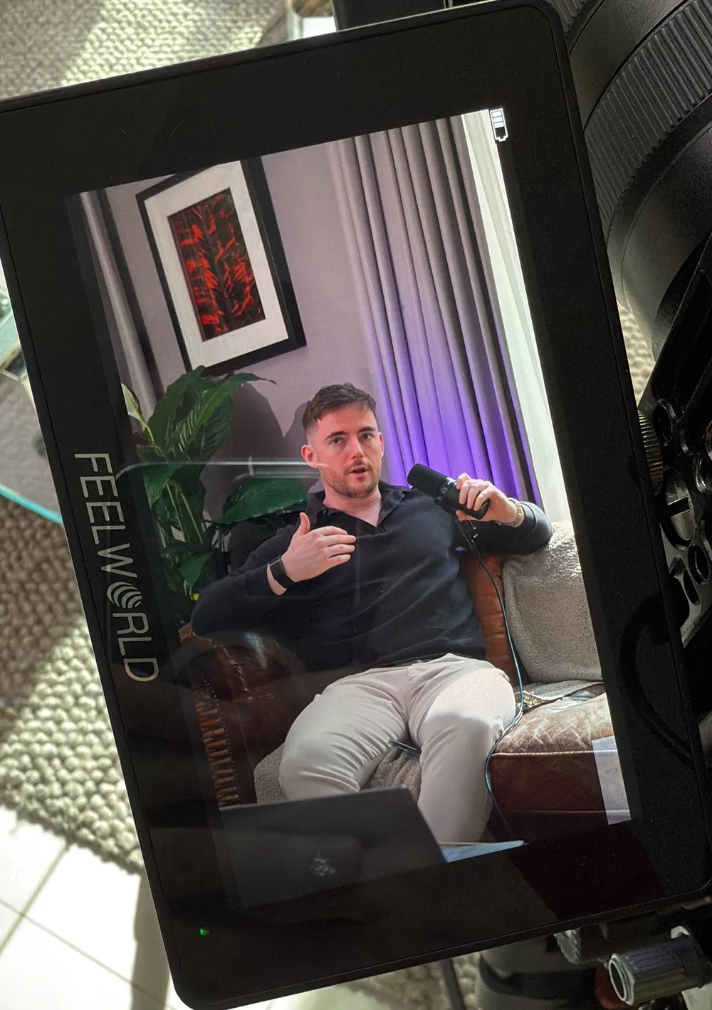 Fake podcast set on the camera monitor