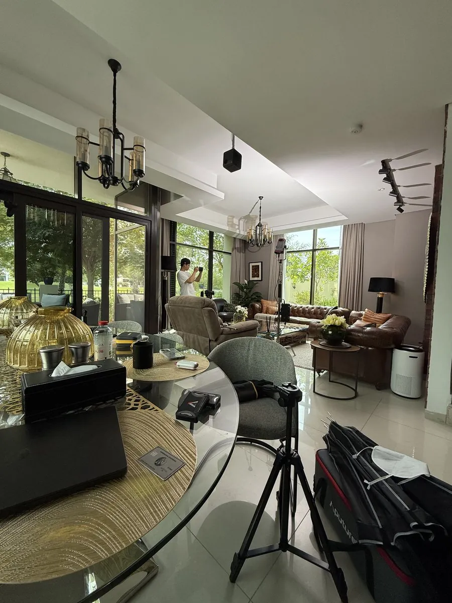 Filming setup at home with a videographer