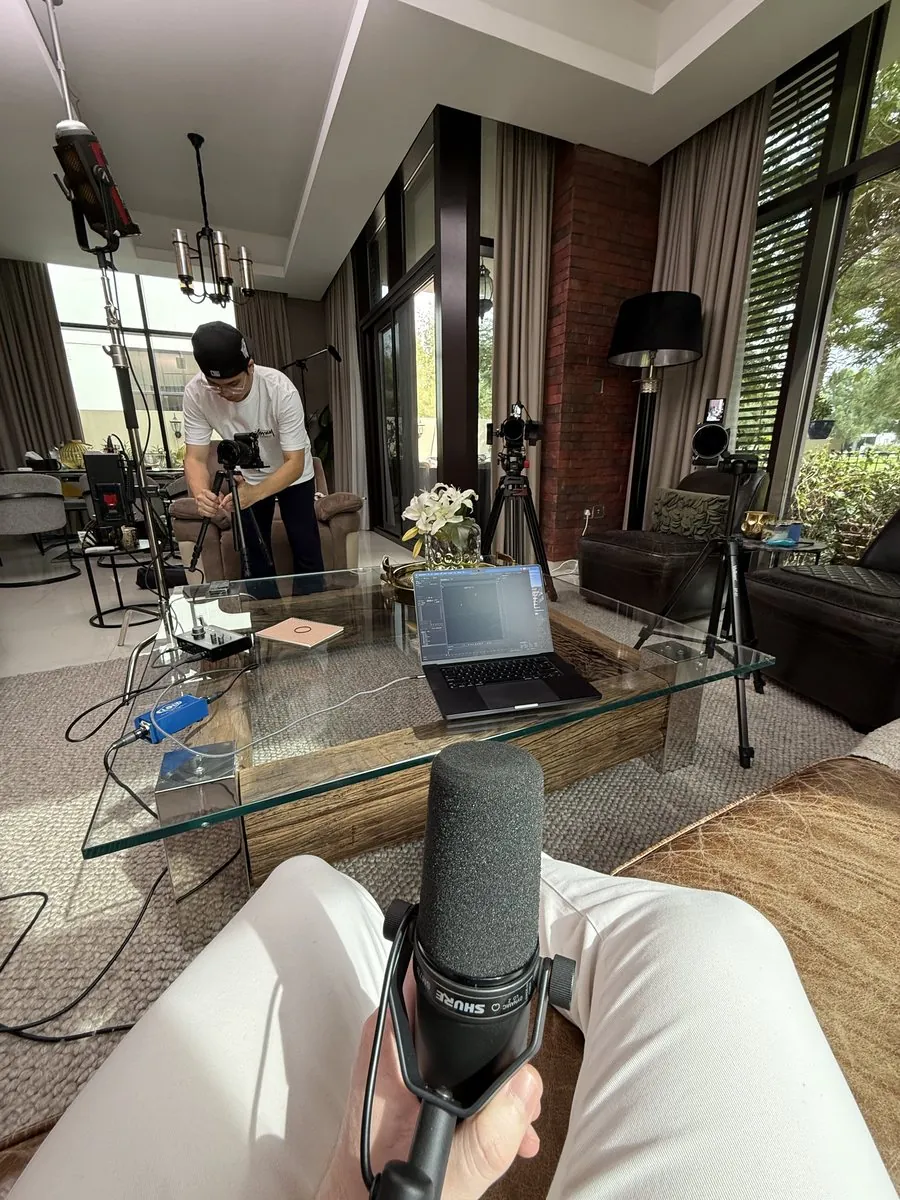 Videographer filming at home